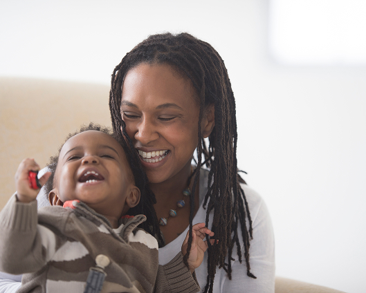A mother and her child enjoying family time together.