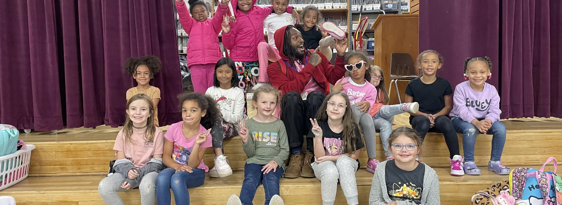 Kids and staff smiling